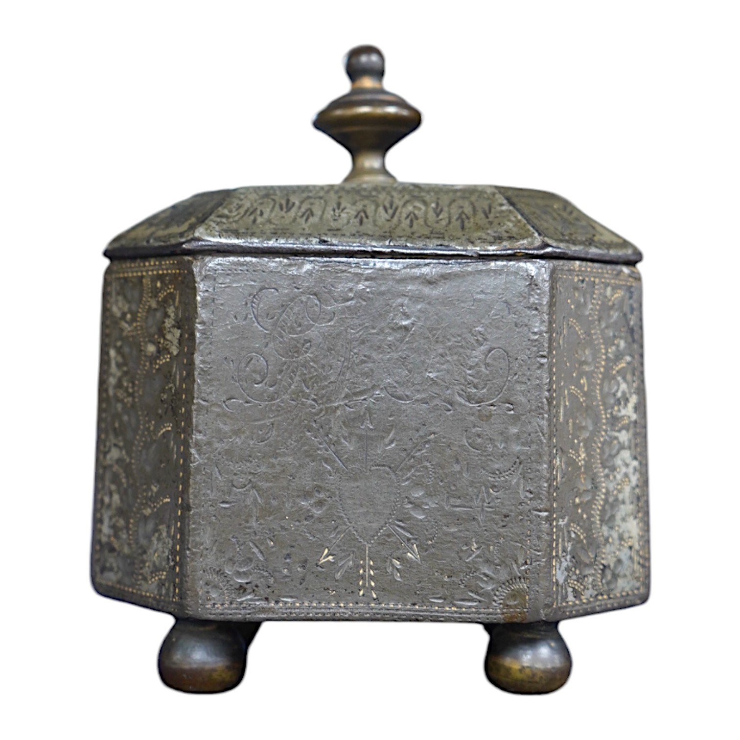 An unusual George III engraved cast iron tobacco box and cover, possibly Sailor decorated with the inscriptions, Love, Liberty and Trade, a phoenix ship and anchor, 11cm high. Condition - fair, general wear to the surfac